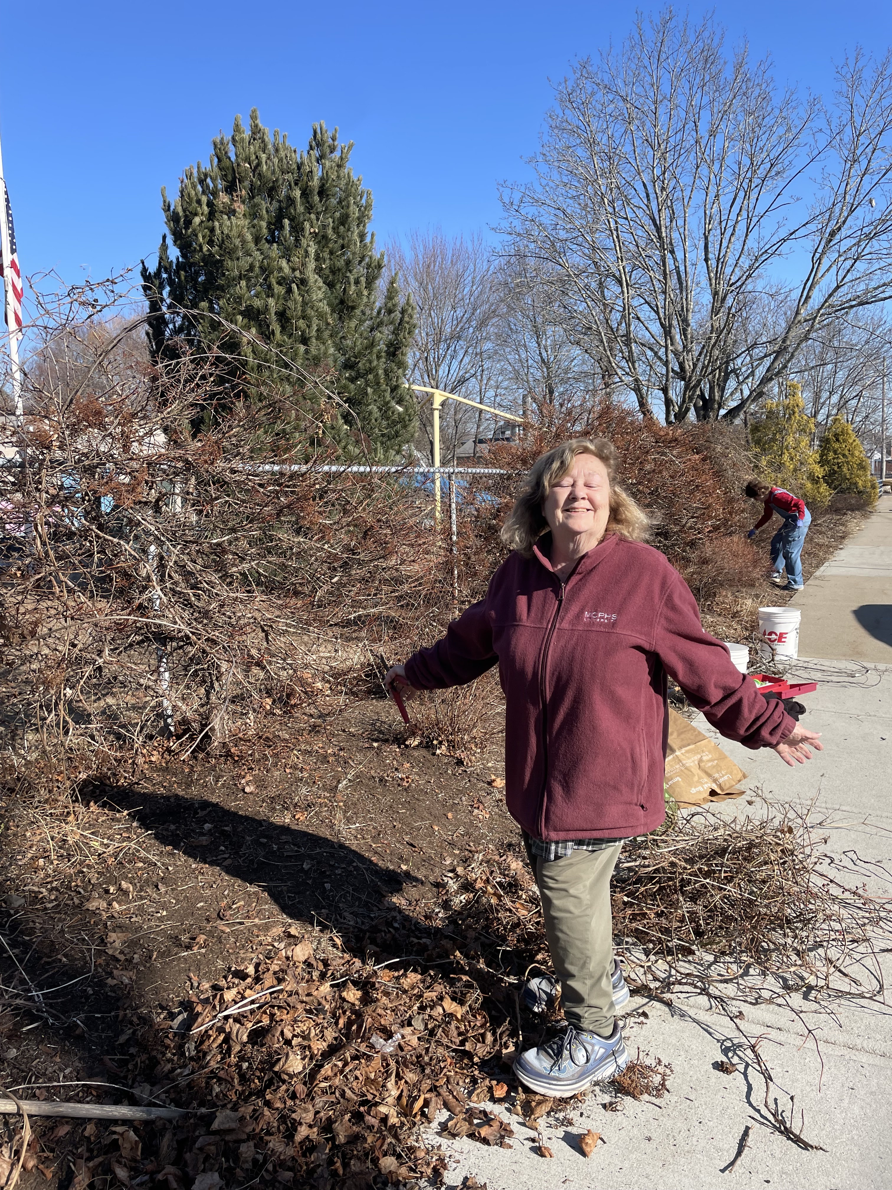 Club members clean up the garden at Hawes Pool Park